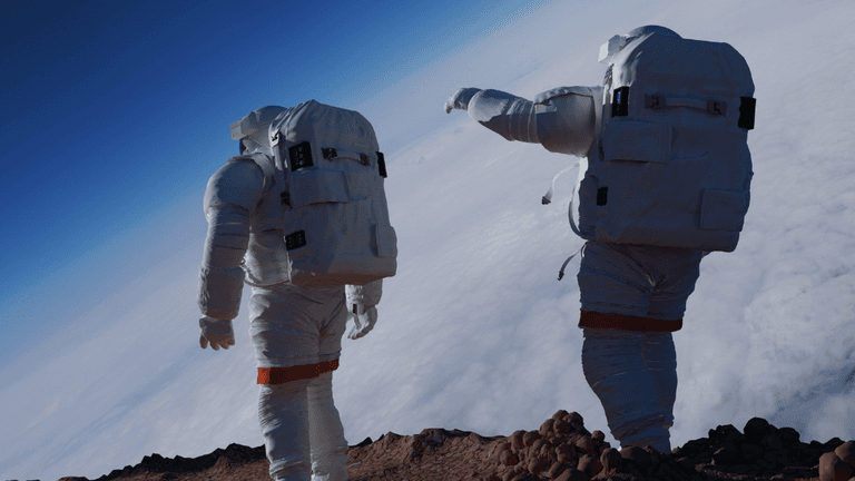 Two astronauts in space suits standing on a rocky surface above clouds